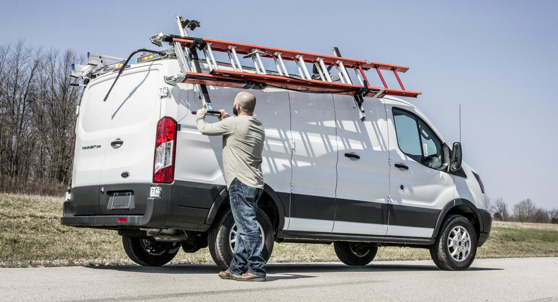 ladder rack man outside van